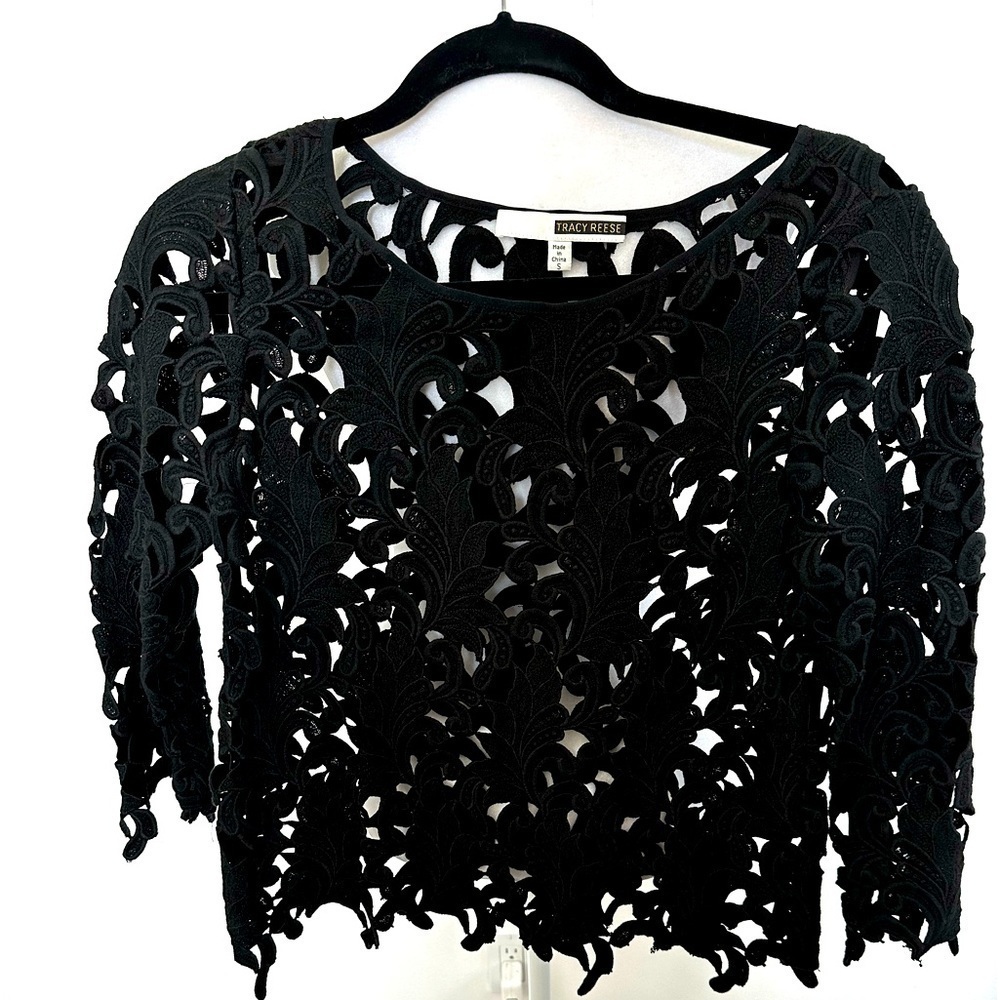 Tracy Reese Black Long sleeve Top to with cotton leaf designs. Like New. Size S